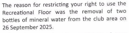 Legal letter excerpt stating that the restriction reason was removal of two bottles of mineral water